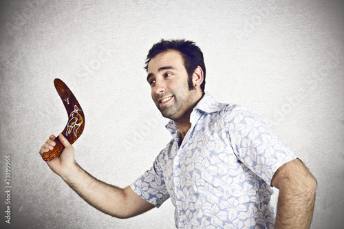Schilderij op canvas Man trowing a traditional boomerang