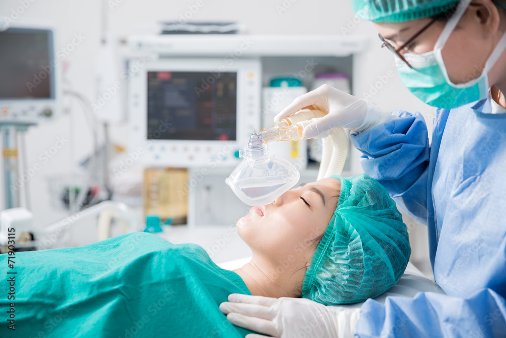 Young female patient receiving artificial ventilation Young female patient receiving artificial ventilation