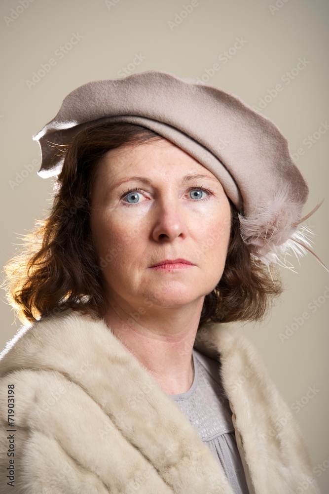 Brunette in taupe hat and fur stole Brunette in taupe hat and fur stole
