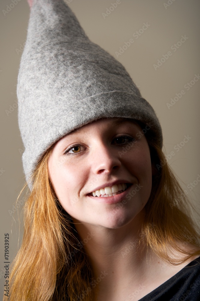 Close-up of redhead in grey felt hat Close-up of redhead in grey felt hat