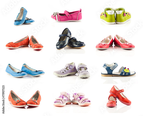 children shoes isolated on white background. collection of dif
