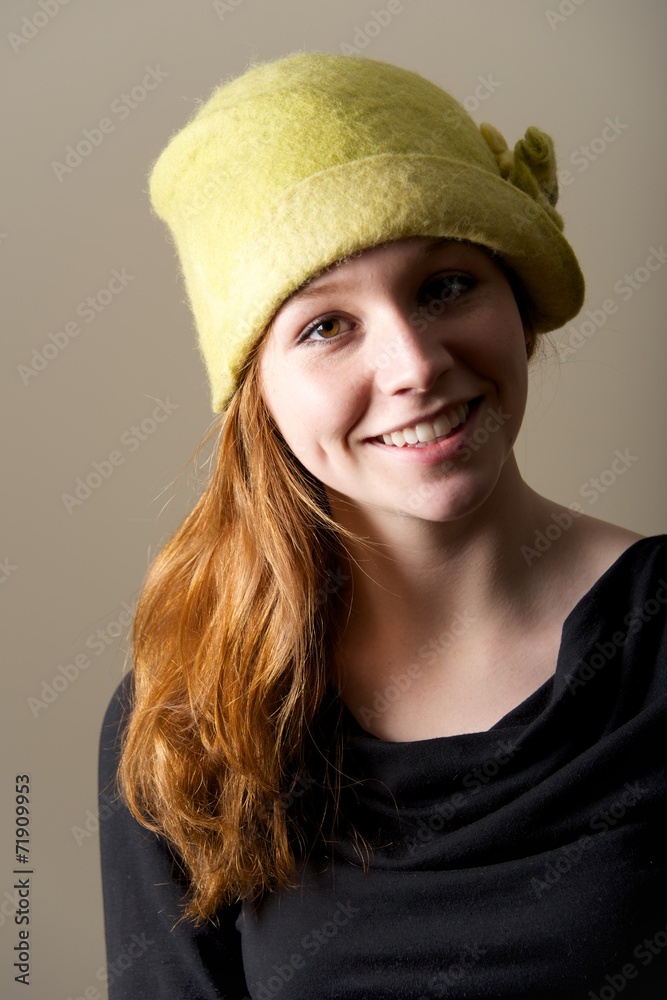 Smiling redhead with dimples in green hat Smiling redhead with dimples in green hat