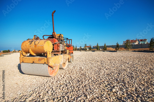 Old Roller (paver) and blue sky