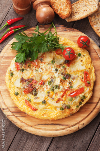 Bild auf Leinwand Tortilla, spanish omelet with potato and vegetables