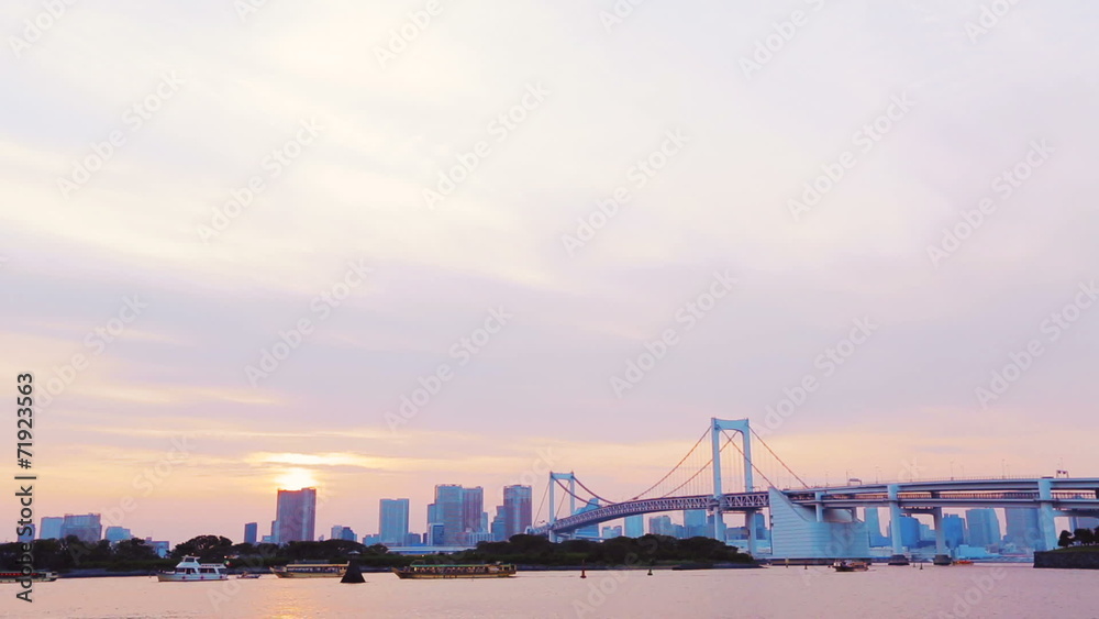 The famous Rainbow Bridge at sunset from Odaiba Bay The famous Rainbow Bridge at sunset from Odaiba Bay
