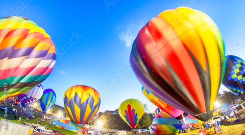 Bright Hot Air Balloons Glowing at Night photo