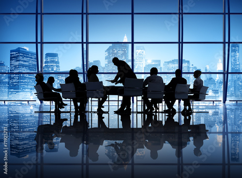 Silhouette of Business People in a Meeting photo