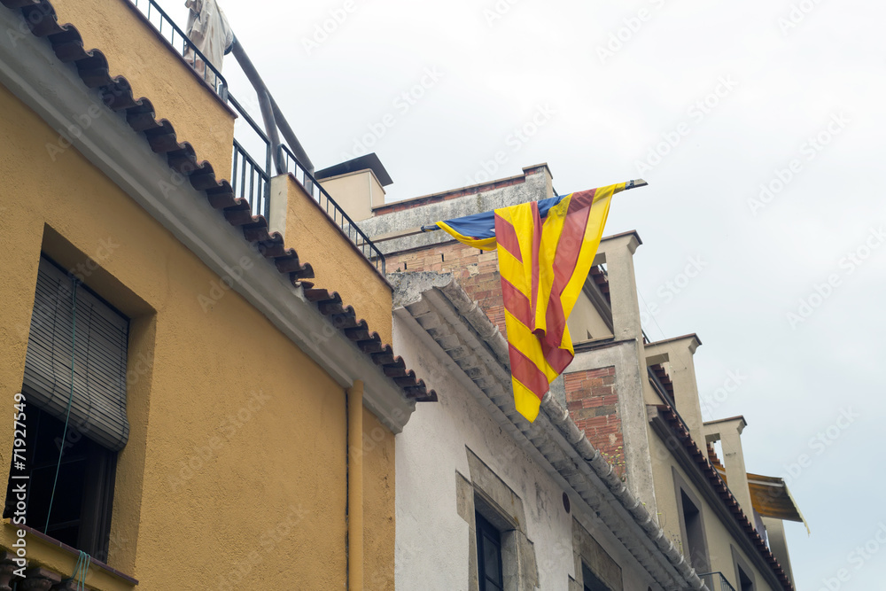 Banner of Catalonia on a house wall