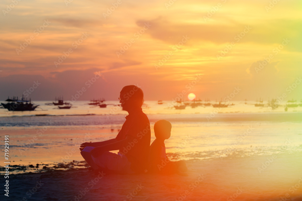 Fototapeta premium father and son looking at sunset