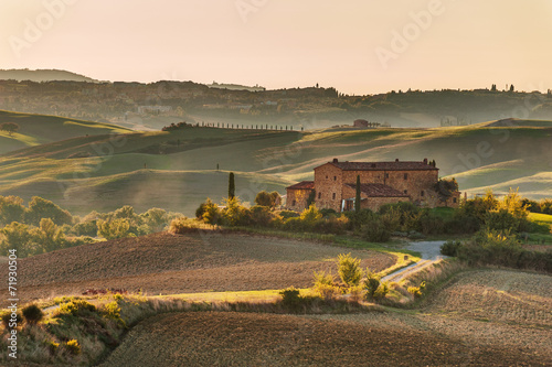 Yellow sunset in amazing Tuscany landscape