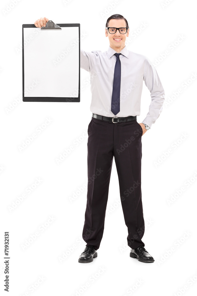 Young businessman holding a clipboard Young businessman holding a clipboard