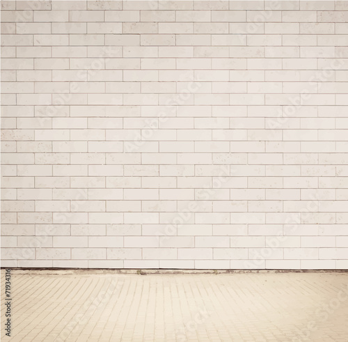 Light grey brick wall texture with walkway.