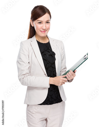 Businesswoman with clipboard © leungchopan