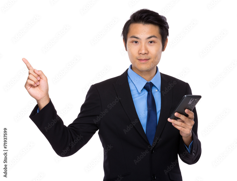 Businessman hold with cellphone and finger up Businessman hold with cellphone and finger up