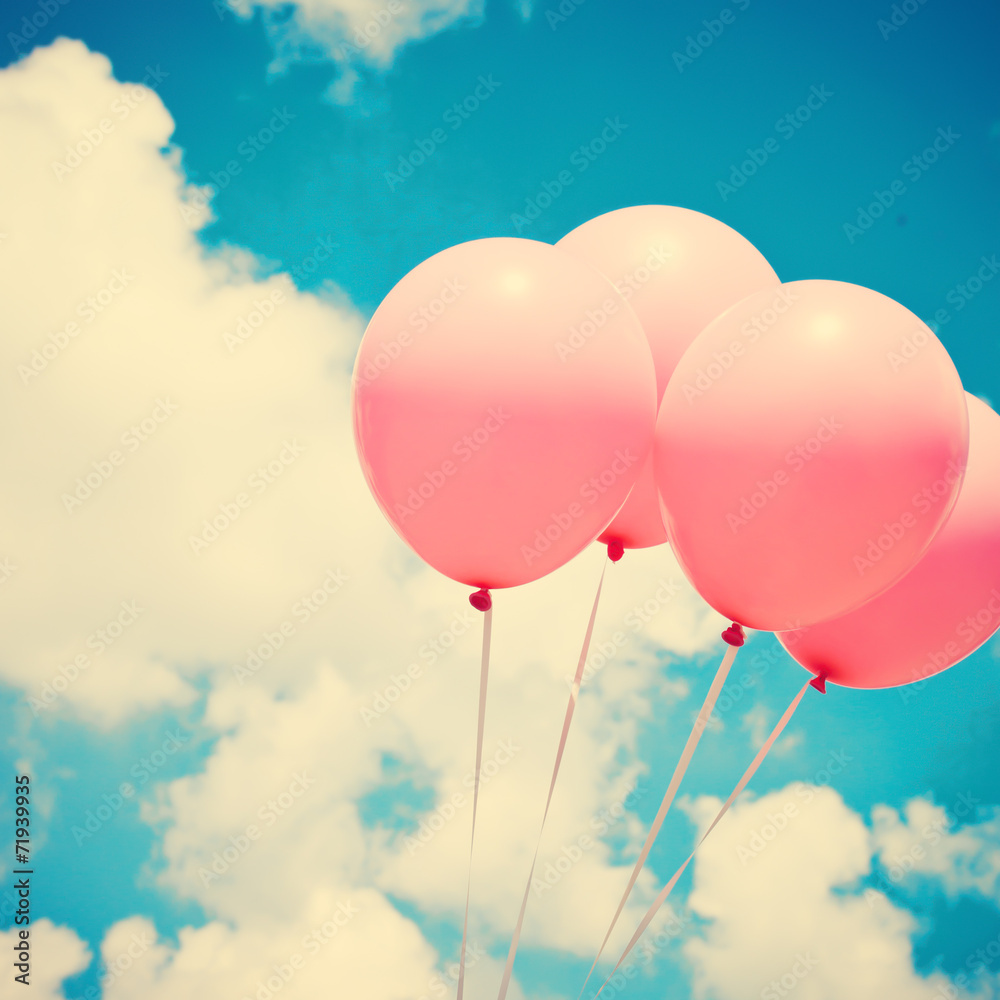 Four pink vintage balloons