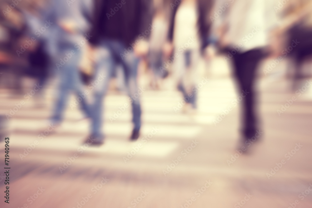 Obraz premium pedestrian on zebra in motion blur