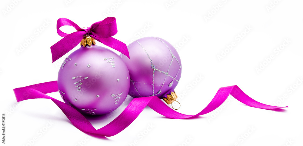 Two lilac christmas balls with ribbon isolated