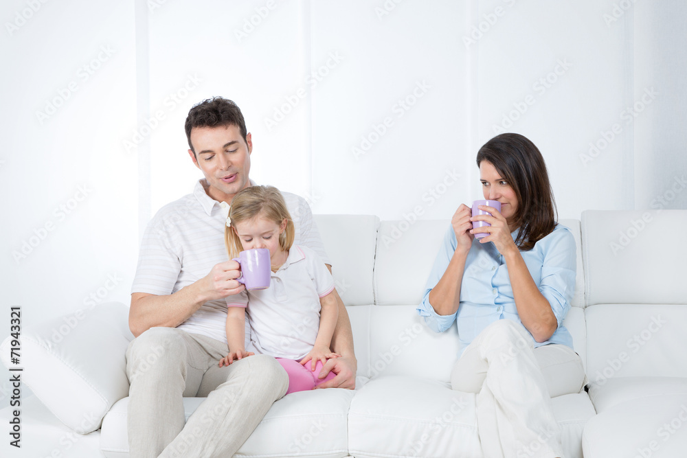 family having breakfast on sofa family having breakfast on sofa