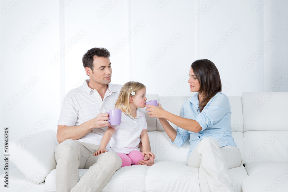 careful parents with little daughter