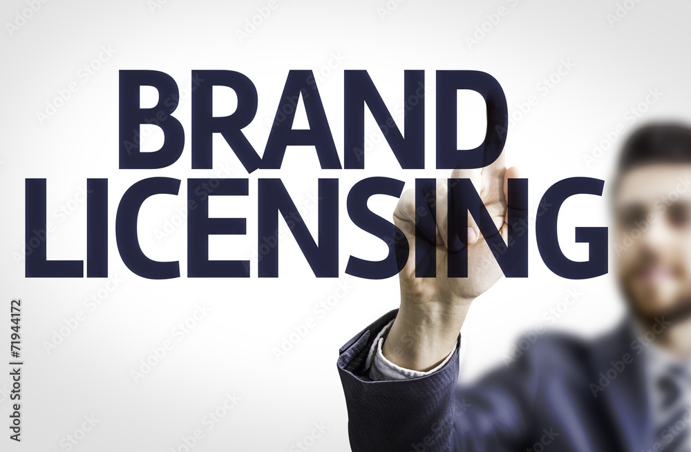 Business man pointing the text: Brand Licensing Business man pointing the text: Brand Licensing