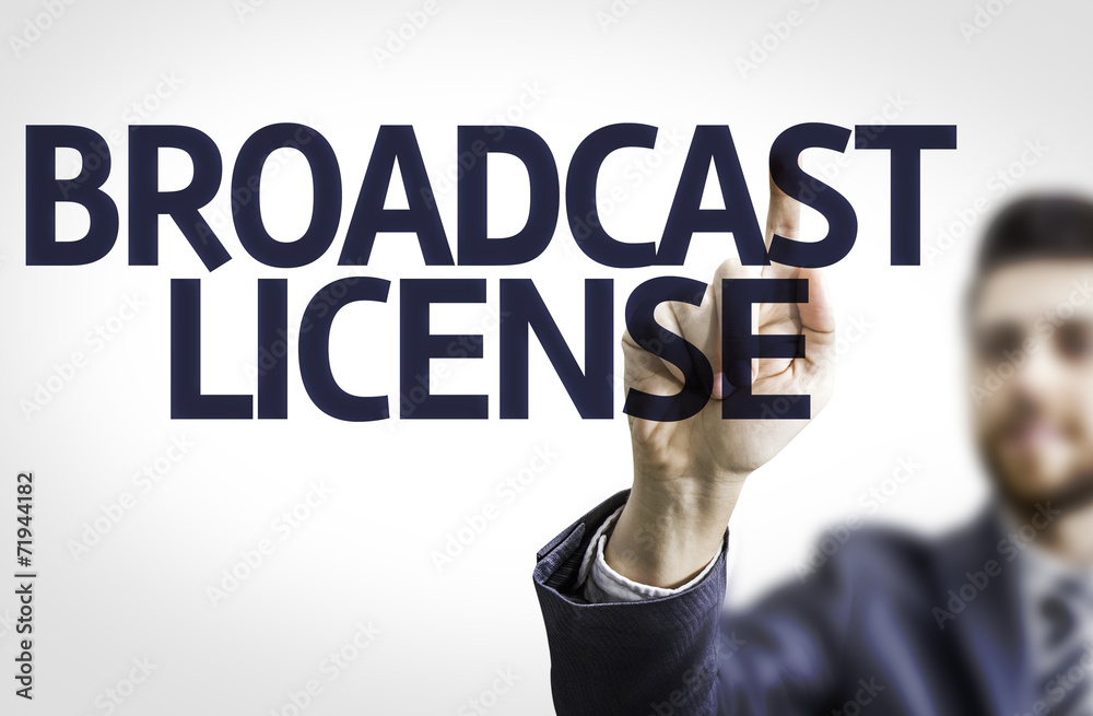 Business man pointing the text: Broadcast License Business man pointing the text: Broadcast License