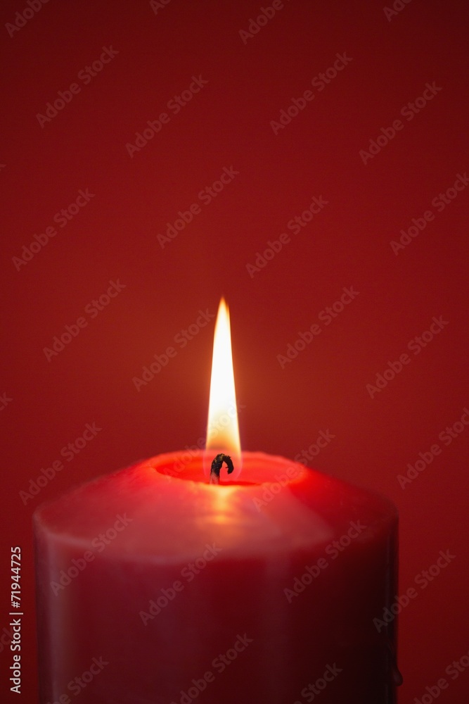 Red candle burning brightly Red candle burning brightly