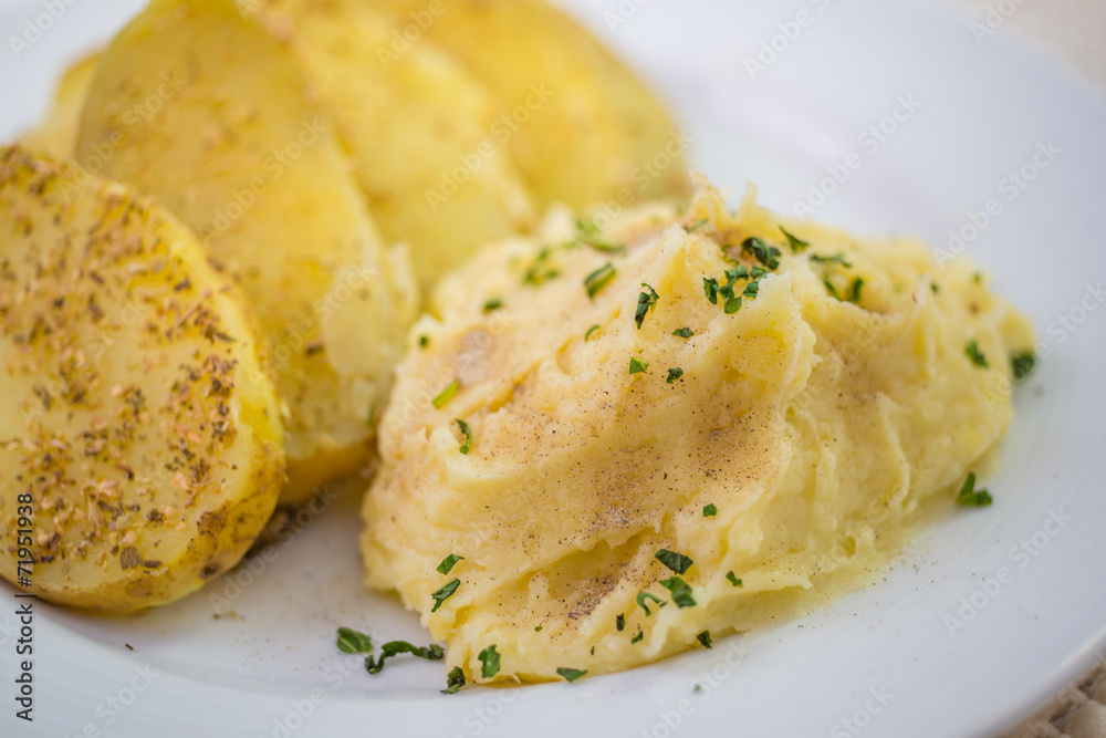 Mashed potatoes and biscuits on a white background. Mashed potatoes and biscuits on a white background.