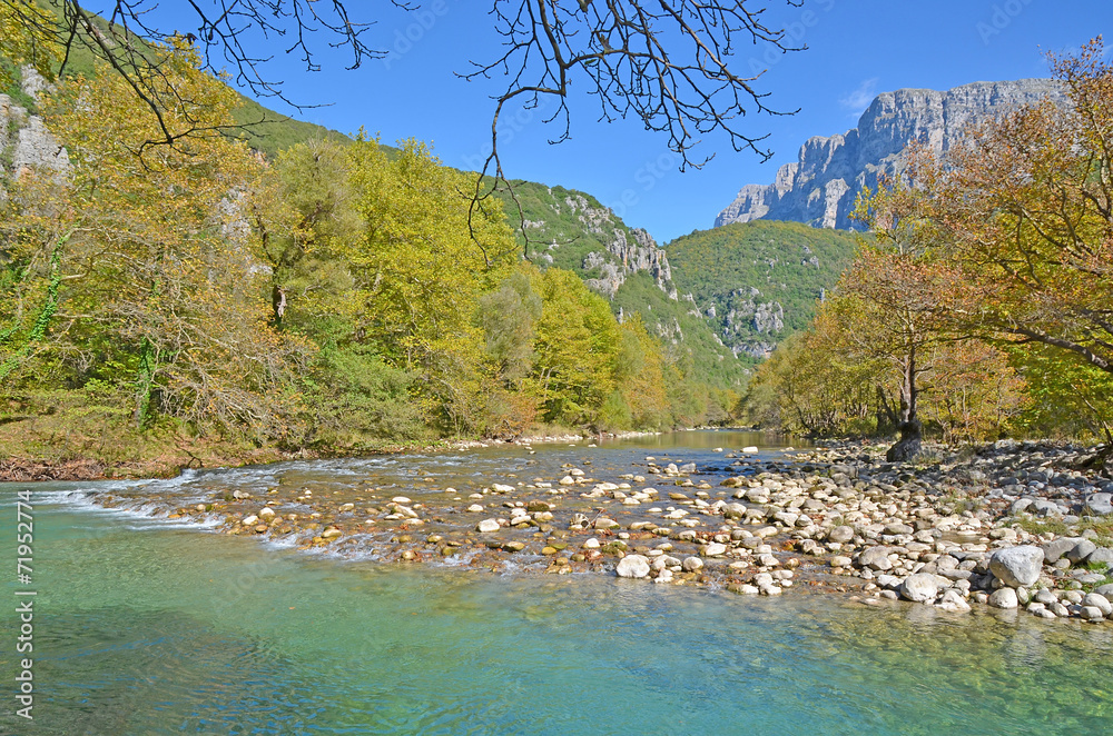 Voidomatis river in Ioannina Greece  - autumn background - obrazy, fototapety, plakaty 