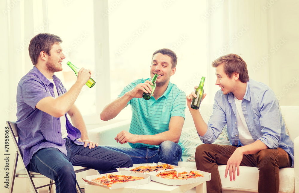 smiling friends with beer and pizza hanging out smiling friends with beer and pizza hanging out