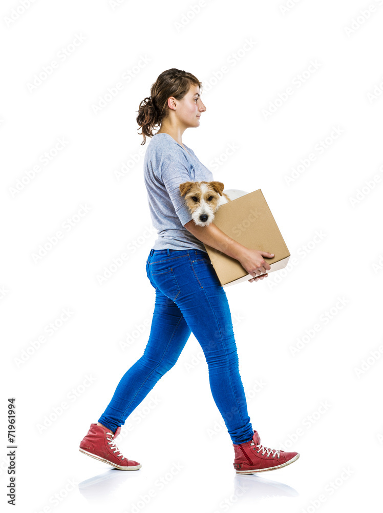 Woman holding dog in box isolated Woman holding dog in box isolated
