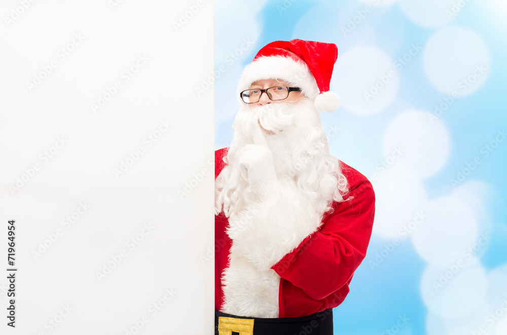 man in costume of santa claus with billboard man in costume of santa claus with billboard