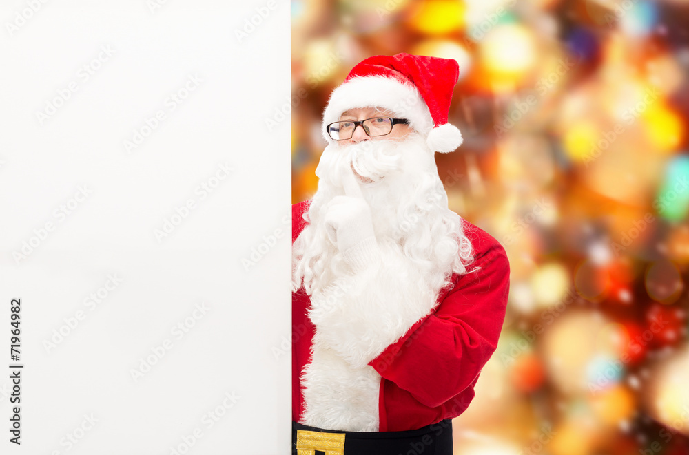man in costume of santa claus with billboard man in costume of santa claus with billboard