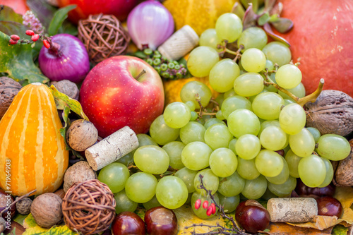 Fototapeta Naklejka Na Ścianę i Meble -  Autumn arrangement of a bunch of fruits and vegetables. Close-up