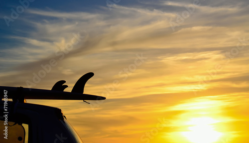 Photography surfboard fins at sunset