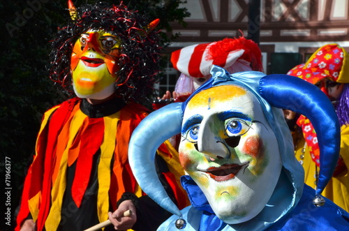 Fototapeta A colorful parade of carnival masks in Riehen, Switzerland