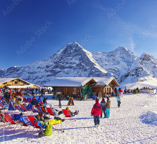 Outdoor lounge on winter sport resort in swiss alps photo