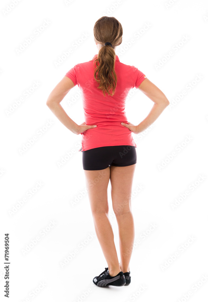 Fototapeta premium model isolated on plain background back hands on hips
