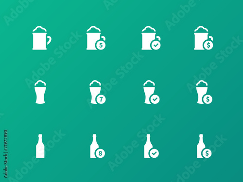 Beer and alcohol glasses icons on green background.