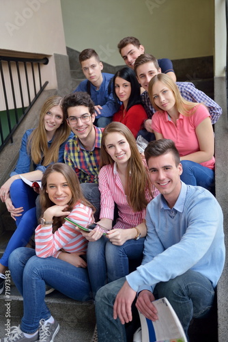 happy teens group in school