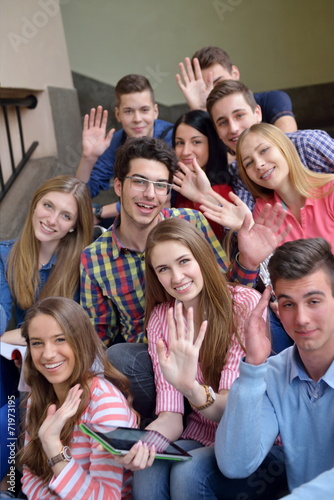 happy teens group in school