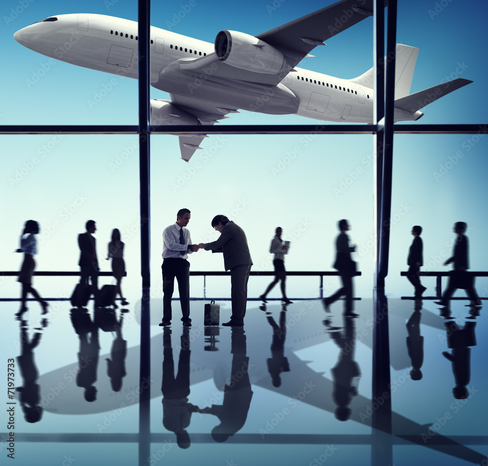 Group of Business People with Airplane Concepts Group of Business People with Airplane Concepts