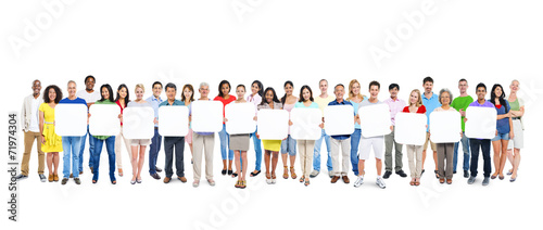 Group Of People Holding A Blank Board