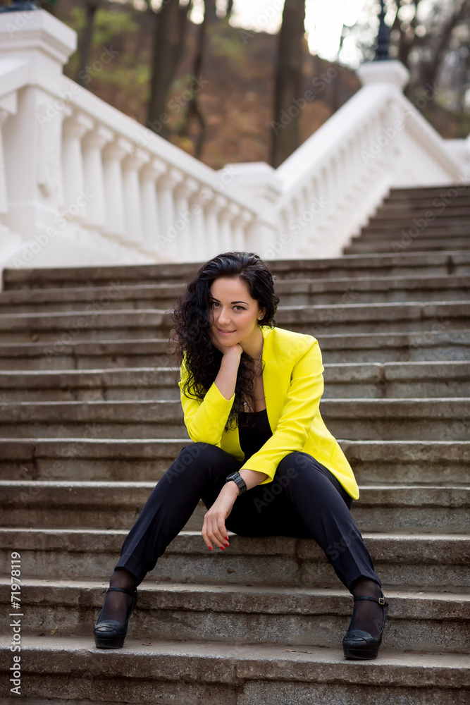 Beautiful Woman in warm autumn day on staircase Beautiful Woman in warm autumn day on staircase