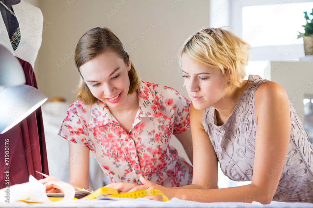 Two sempstress at work