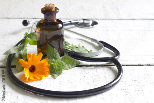 Alternative medicine herbs and stethoscope concept