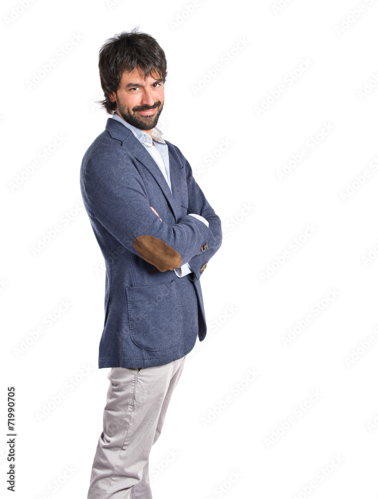 Handsome man with his arms crossed over white background Handsome man with his arms crossed over white background