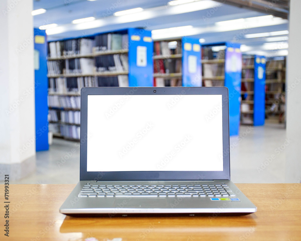 laptop with blank screen on the table in library laptop with blank screen on the table in library