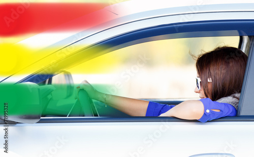 young girl in a car