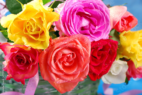 colorful roses in wicker basket