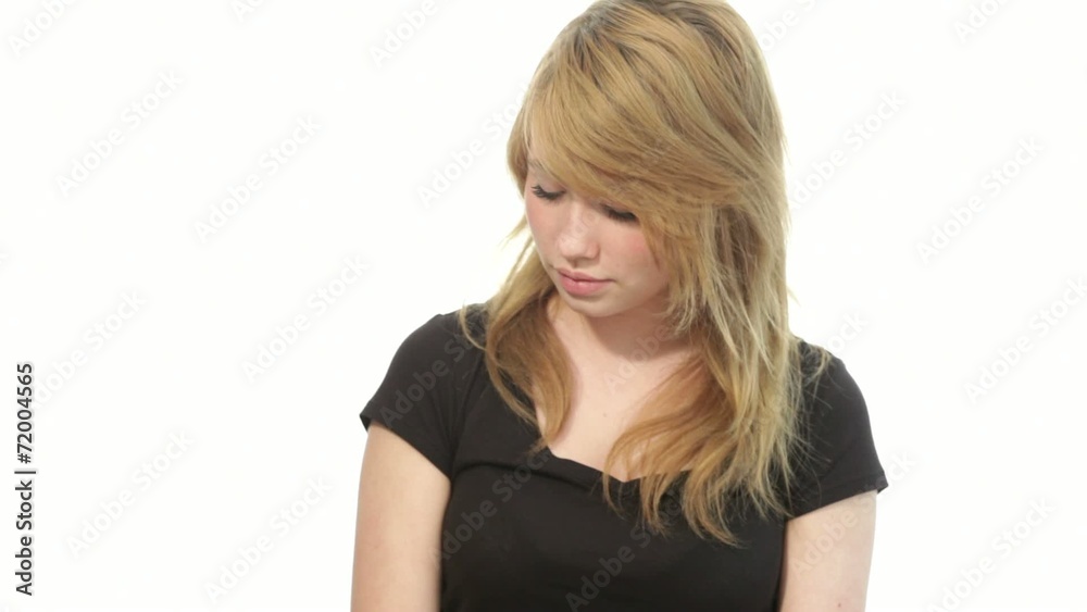 Teenager girl taking a call on his smartphone Teenager girl taking a call on his smartphone
